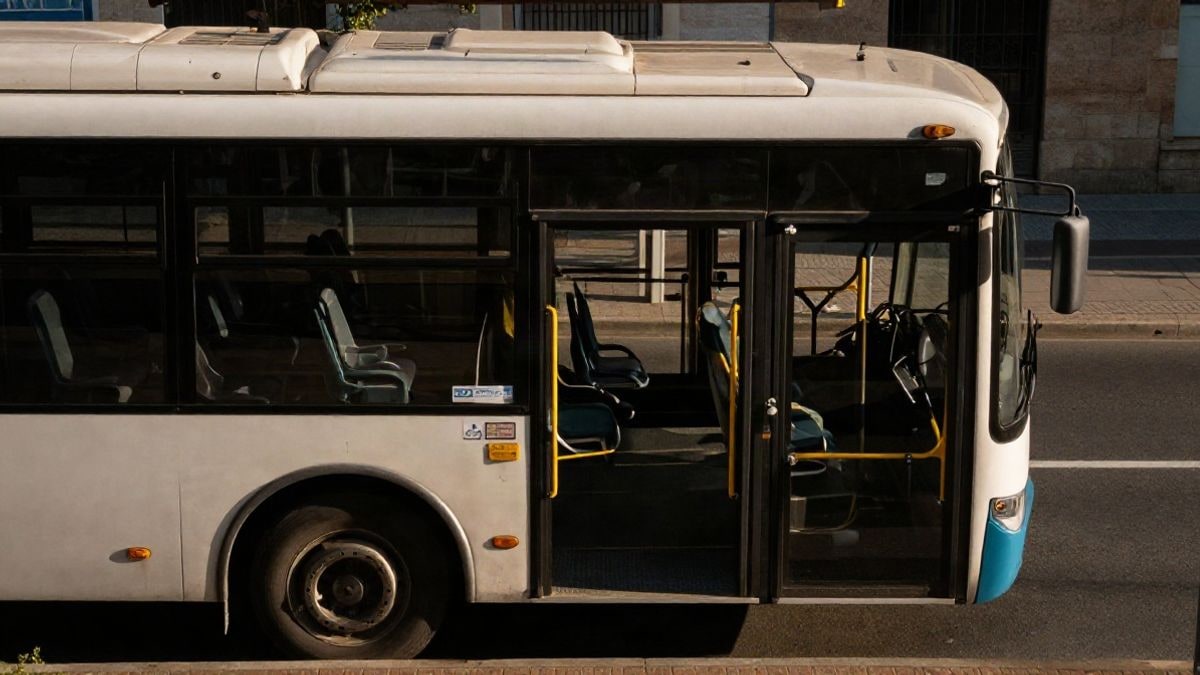 Illustrative image: bus parked at a stop, viewed from above